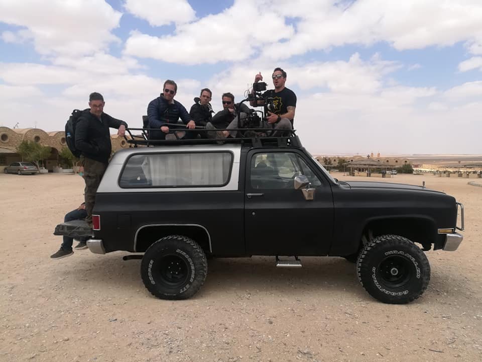 Crew moving by vehicle with a security escort